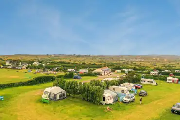 Grass (10m x 12m) pitches with optional electric at Tollgate Farm