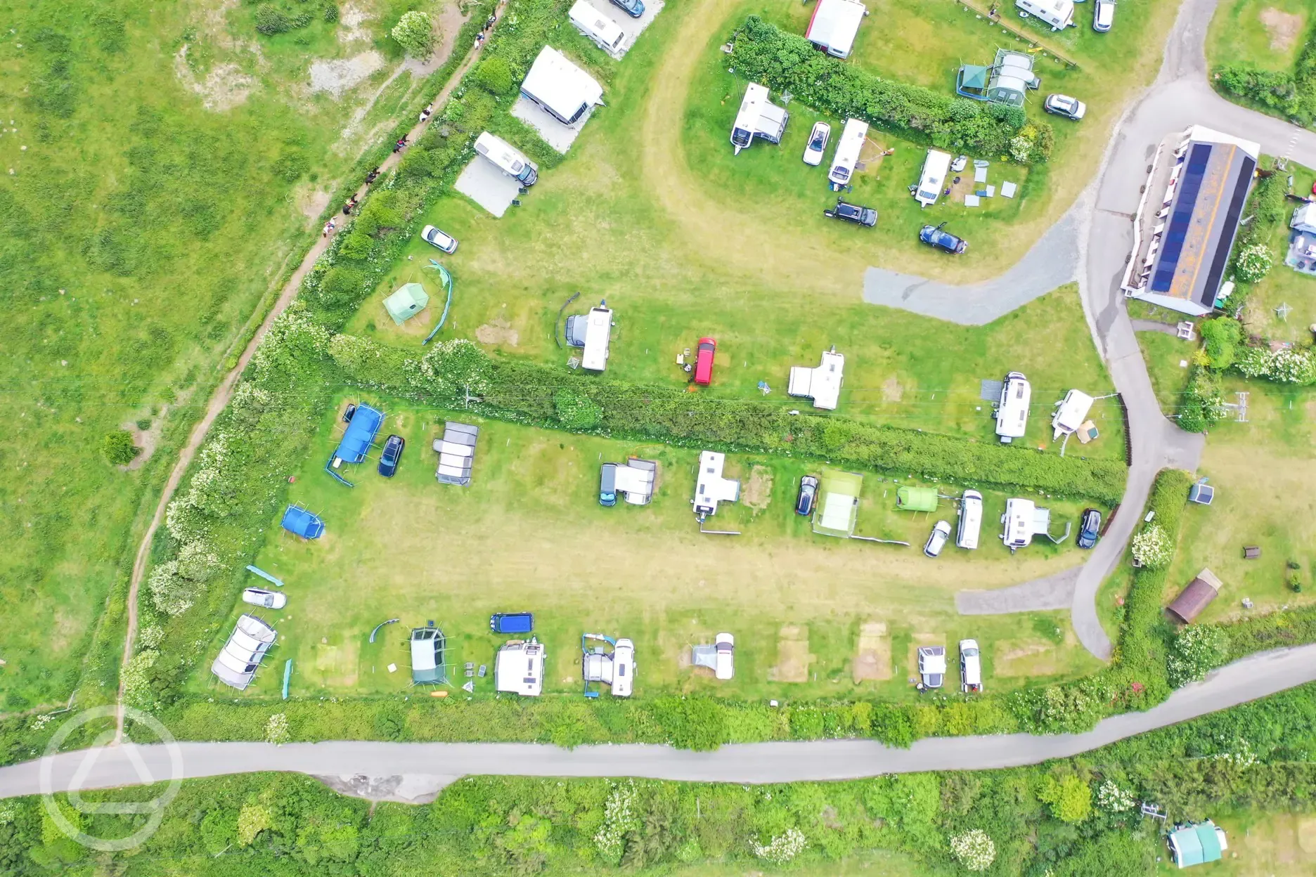 Birdseye view of the grass pitches at Tollgate Farm (awnings allowed)