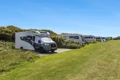 Premium fully serviced hardstanding pitches with optional electric (10m x 10m)