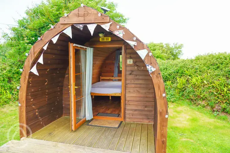 Log pod with a view of the 4ft double bed