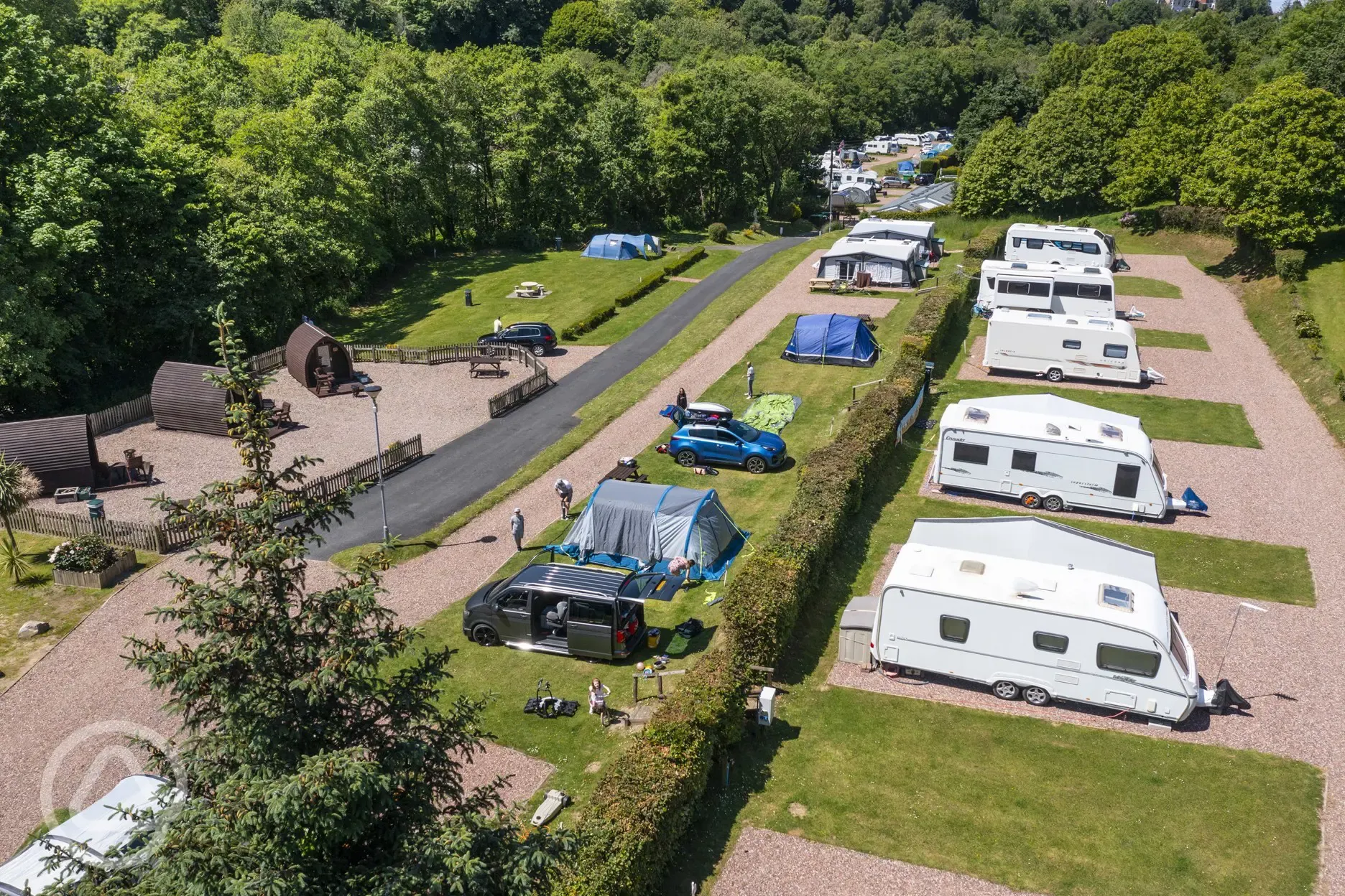 Aerial view of the pitches and camping pods