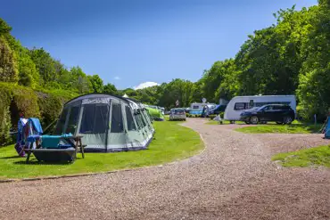 Tents and tourers on the grass and gravel pitches 