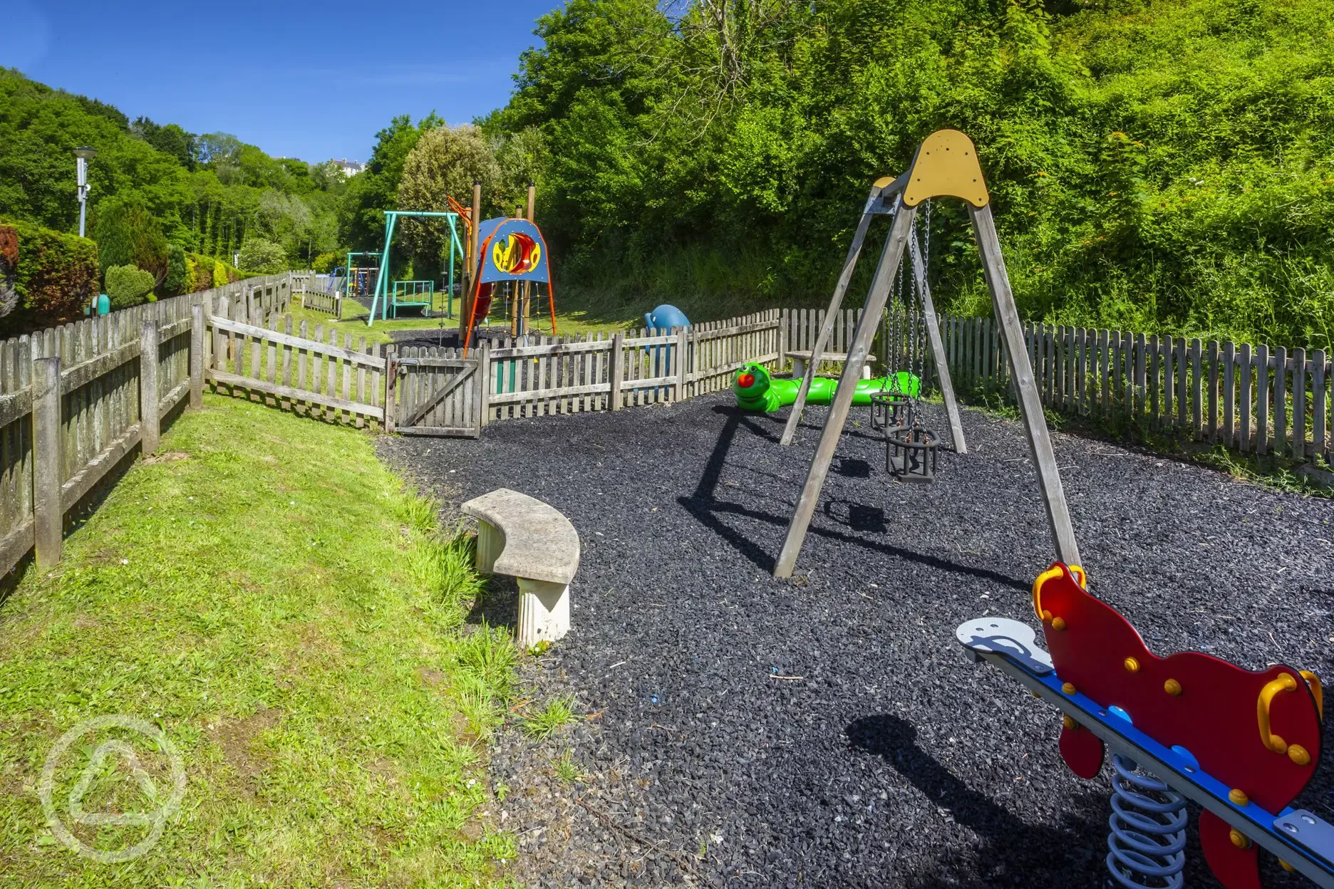 Outdoor play area with swings