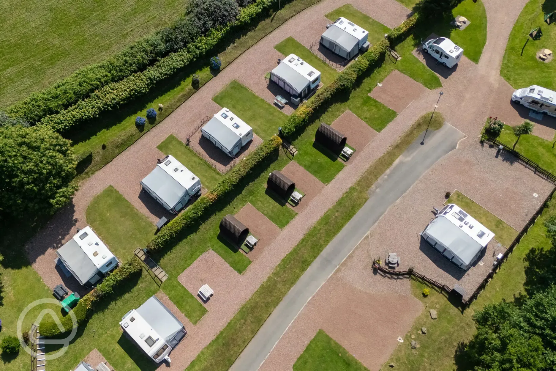 Aerial view of the pitches and camping pods