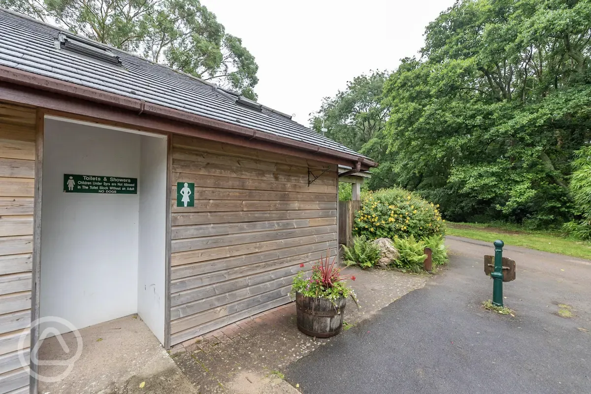 Toilet and shower block