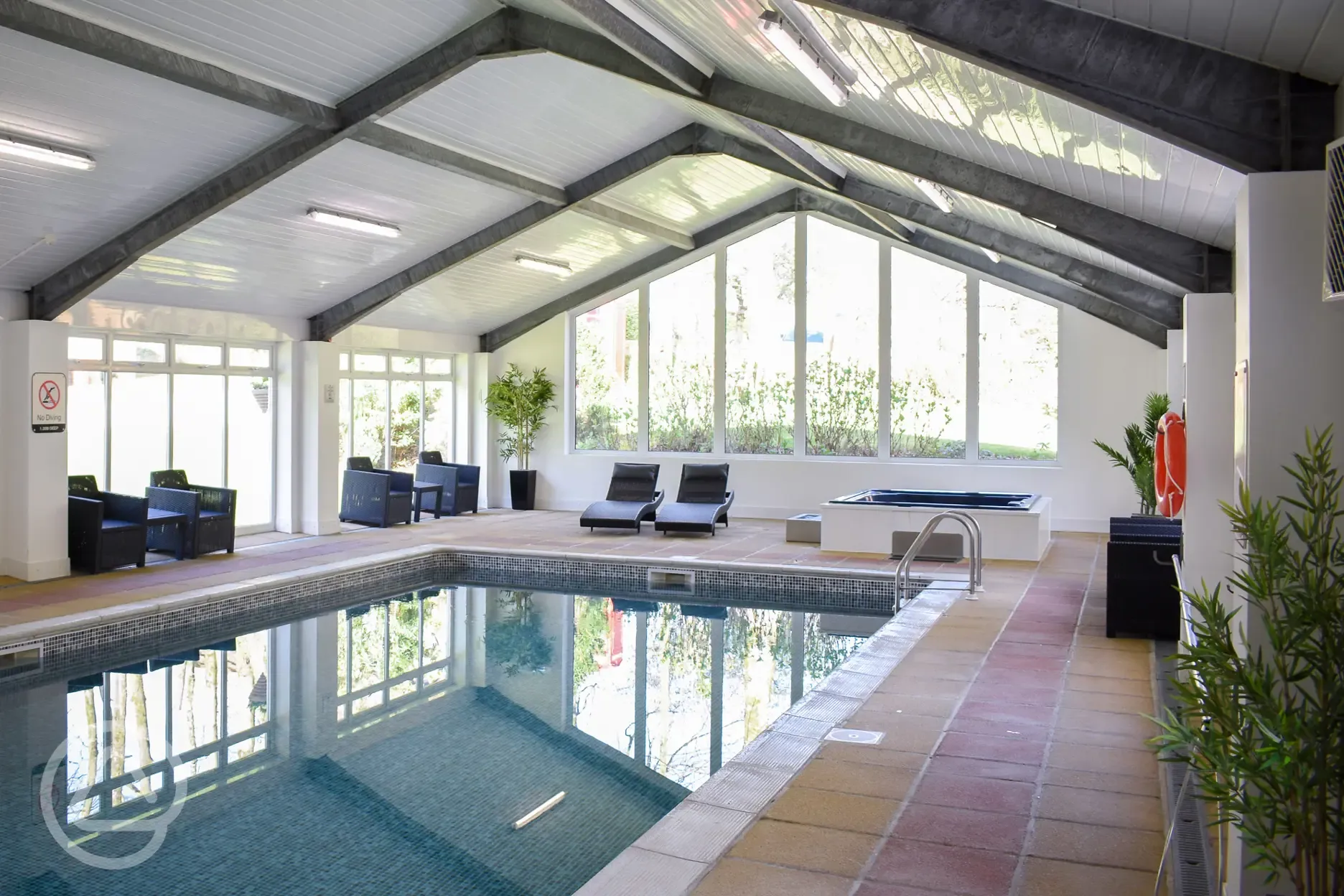 Indoor heated swimming pool and jacuzzi