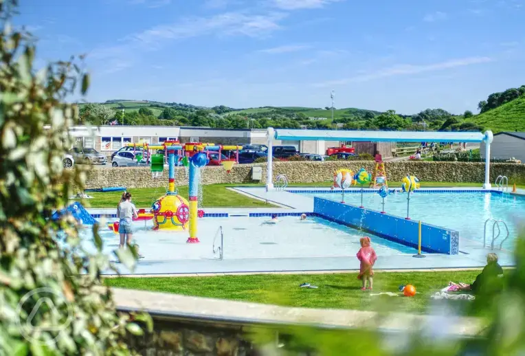 Outdoor swimming pool (open during summer) with a splash zone