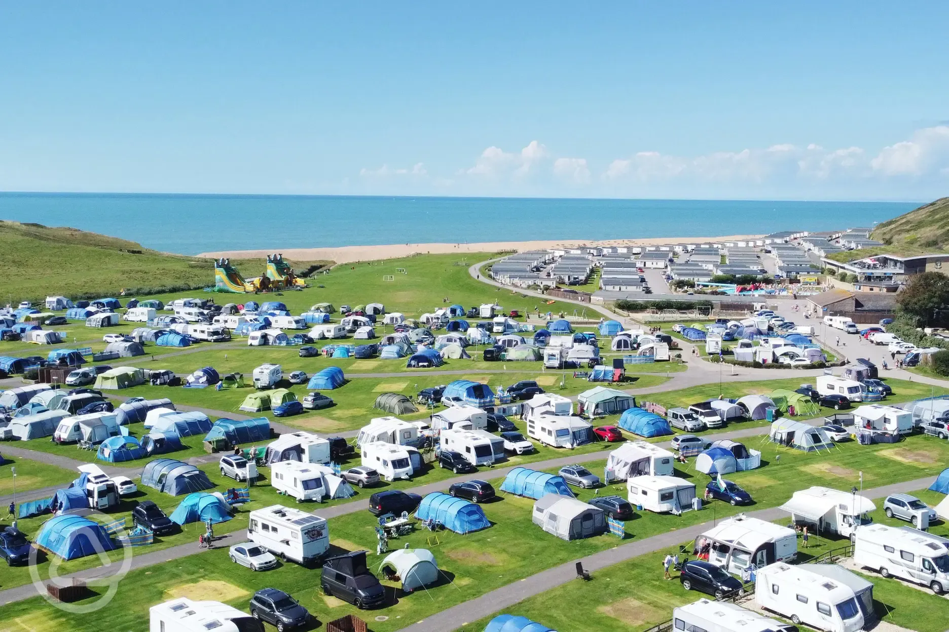 Aerial of campsite by beach 