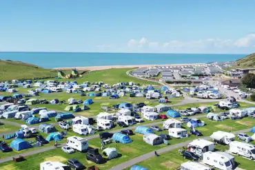 Aerial of campsite by beach 