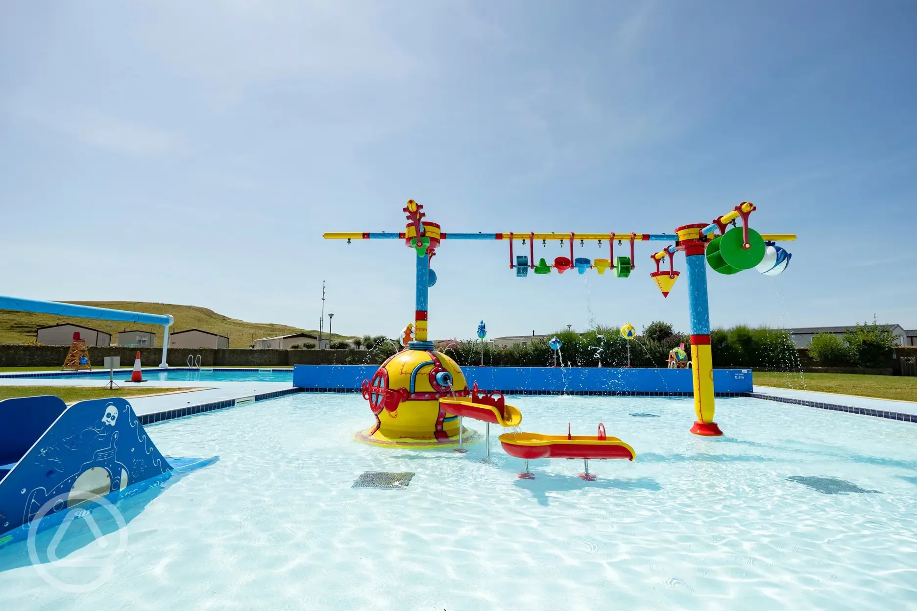 Outdoor swimming pool (open in summer) with a splash zone and cannons