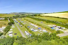 Aerial of the Top Field with electric grass and hardstanding pitches (16 amp) Aerial of the Top Field with electric grass and hardstanding pitches (16 amp)