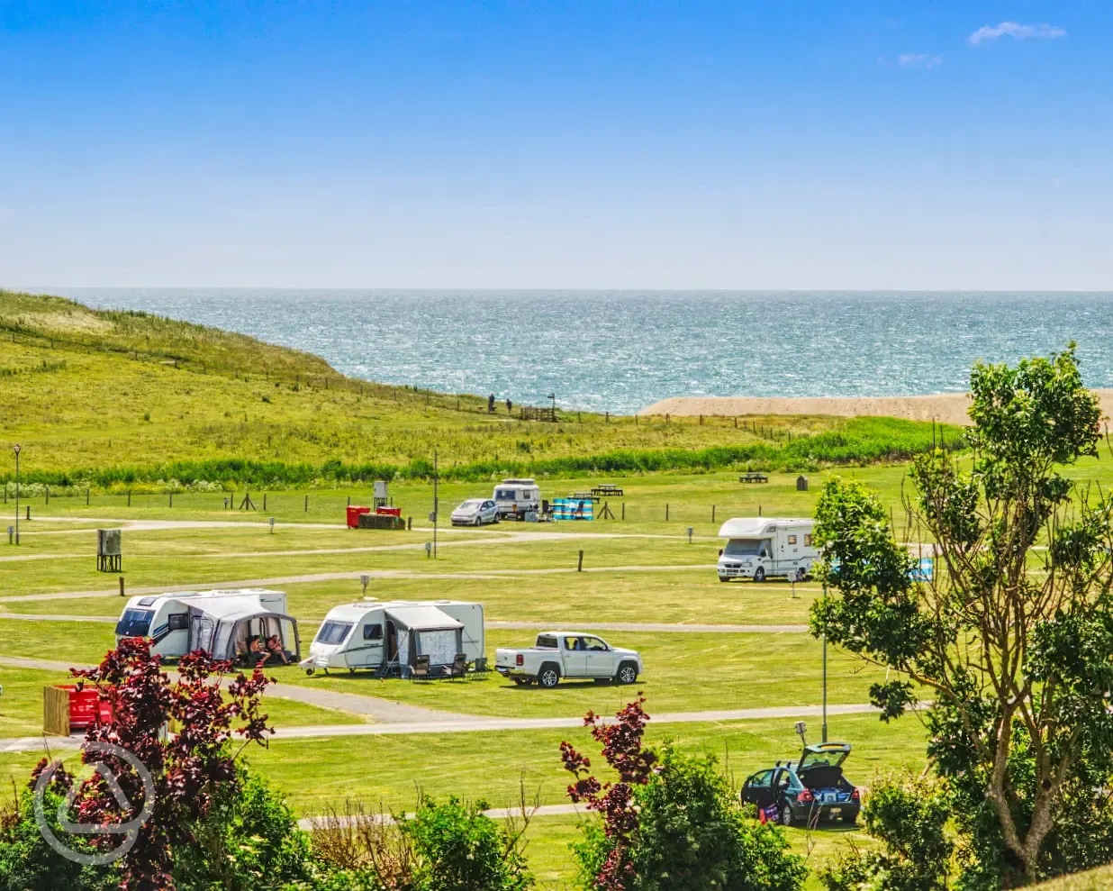 Electric grass pitches (main field) with sea views