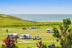 Electric grass pitches (main field) with sea views Electric grass pitches (main field) with sea views