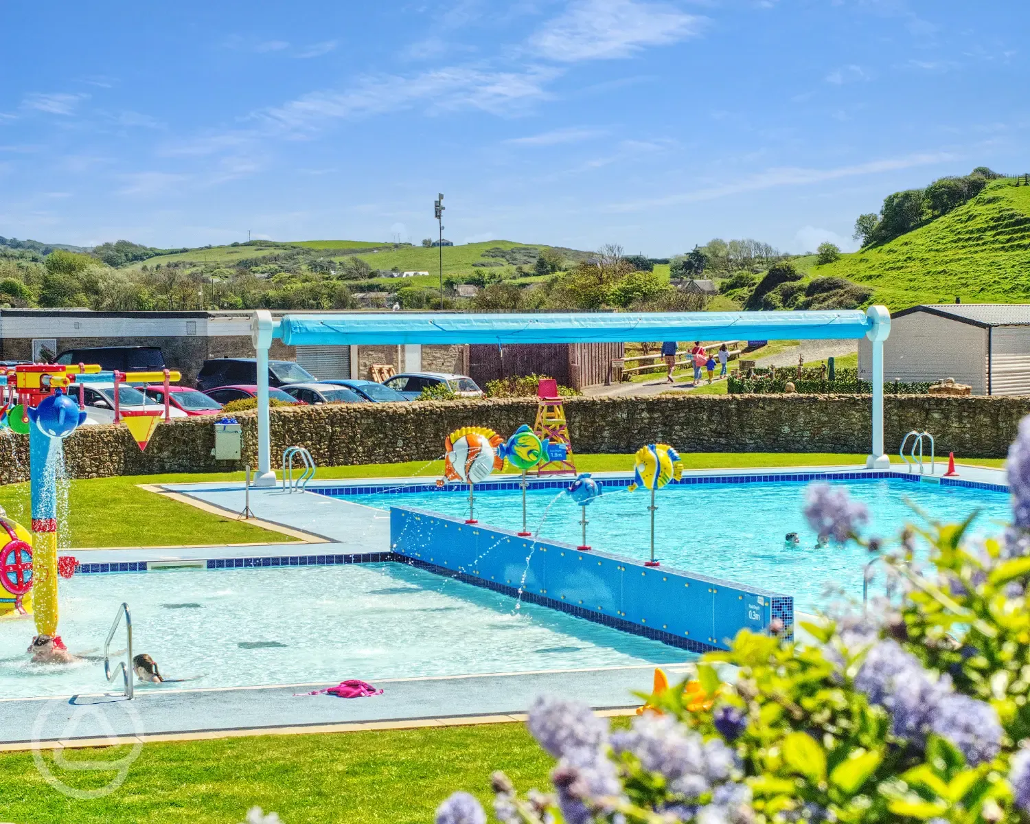 Outdoor swimming pool (open in summer) with a splash zone and cannons