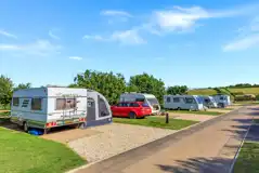 Fully serviced hardstanding pitches with water connection and waste drainage Fully serviced hardstanding pitches with water connection and waste drainage