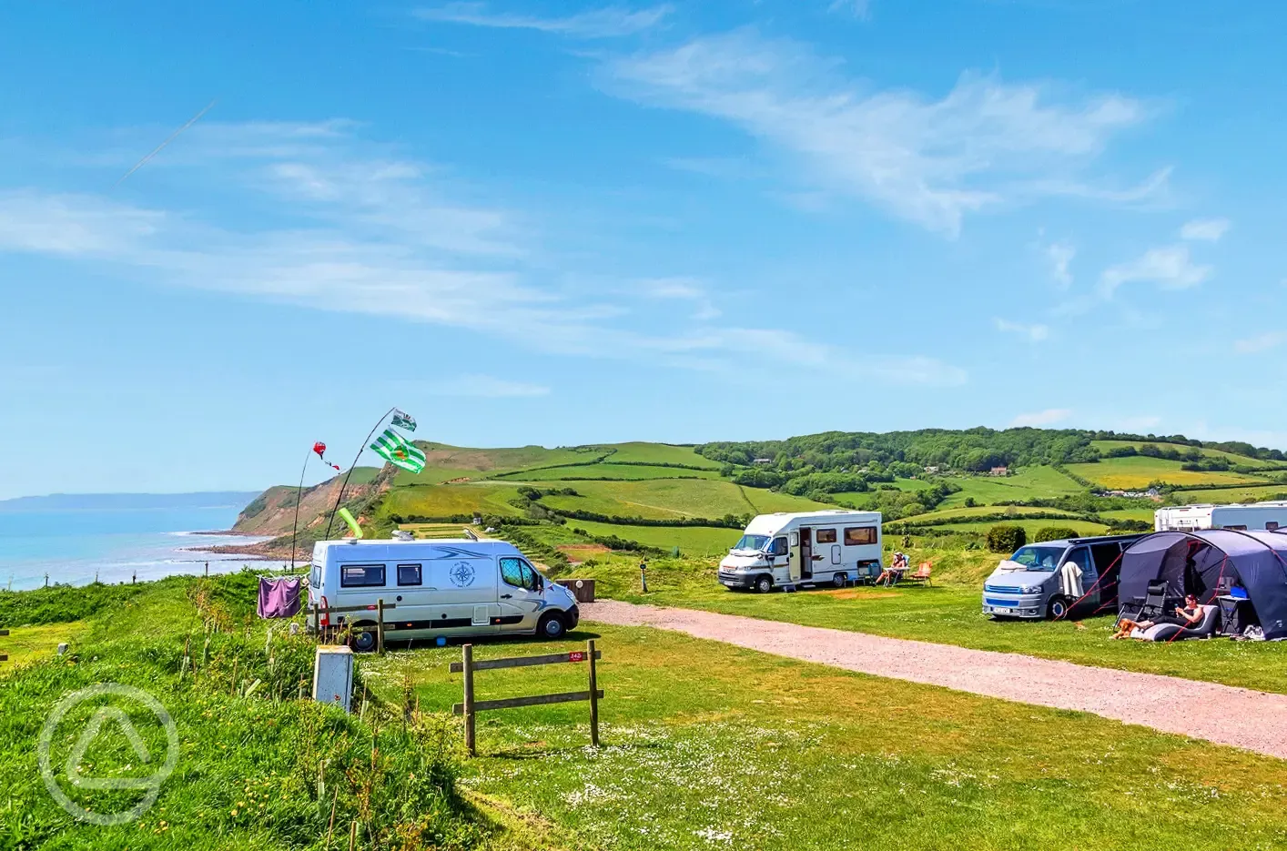 Electric grass pitches at Highlands End Holiday Park, measuring 5m by 8m
