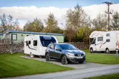 Fully serviced hardstanding pitches with space for a parked car Fully serviced hardstanding pitches with space for a parked car