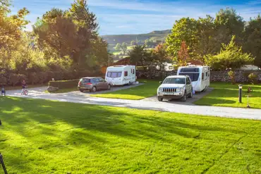 Fully serviced hardstanding pitches at Langcliffe Caravan Park for tourers