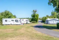 Electric grass pitches (4m x 6m) with space for an awning