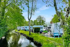 Electric hardstanding touring pitches by the River Yeo