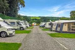 Electric hardstanding touring pitches with grassed areas between