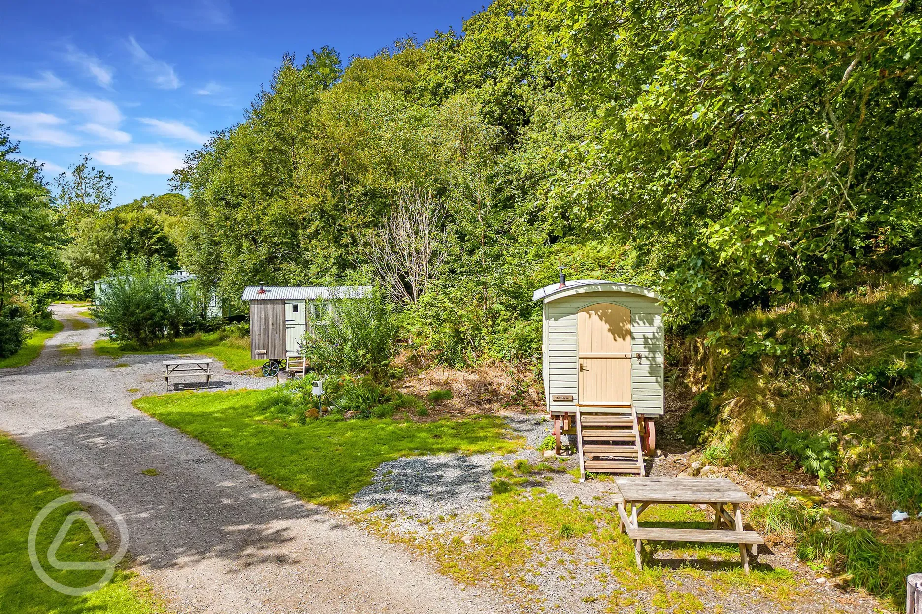 Shepherd's hut with step access and picnic benches