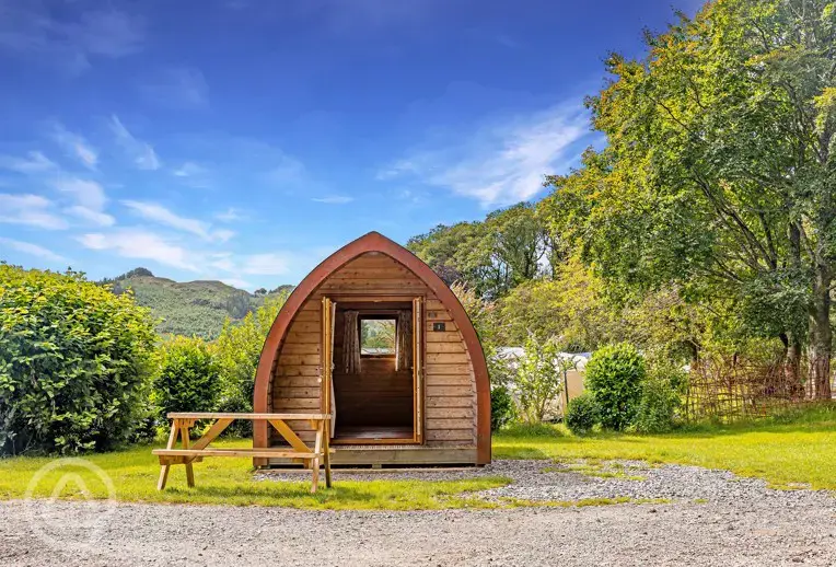 Camping pods with an outdoor picnic bench