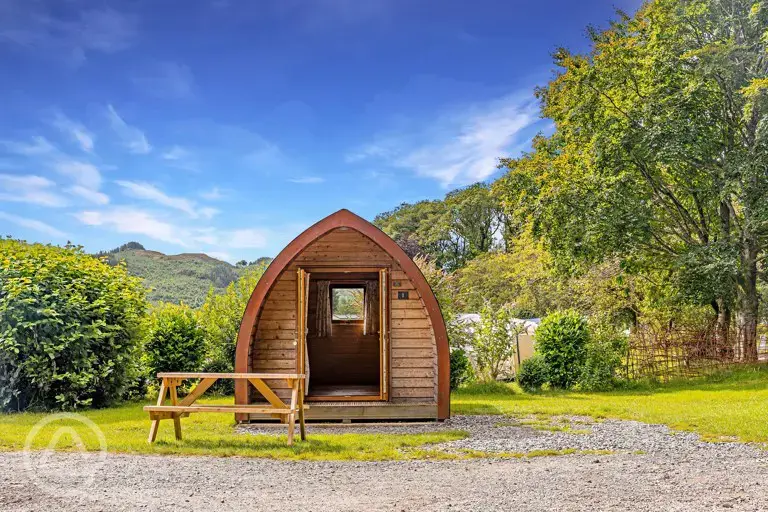 Camping pods with an outdoor picnic bench