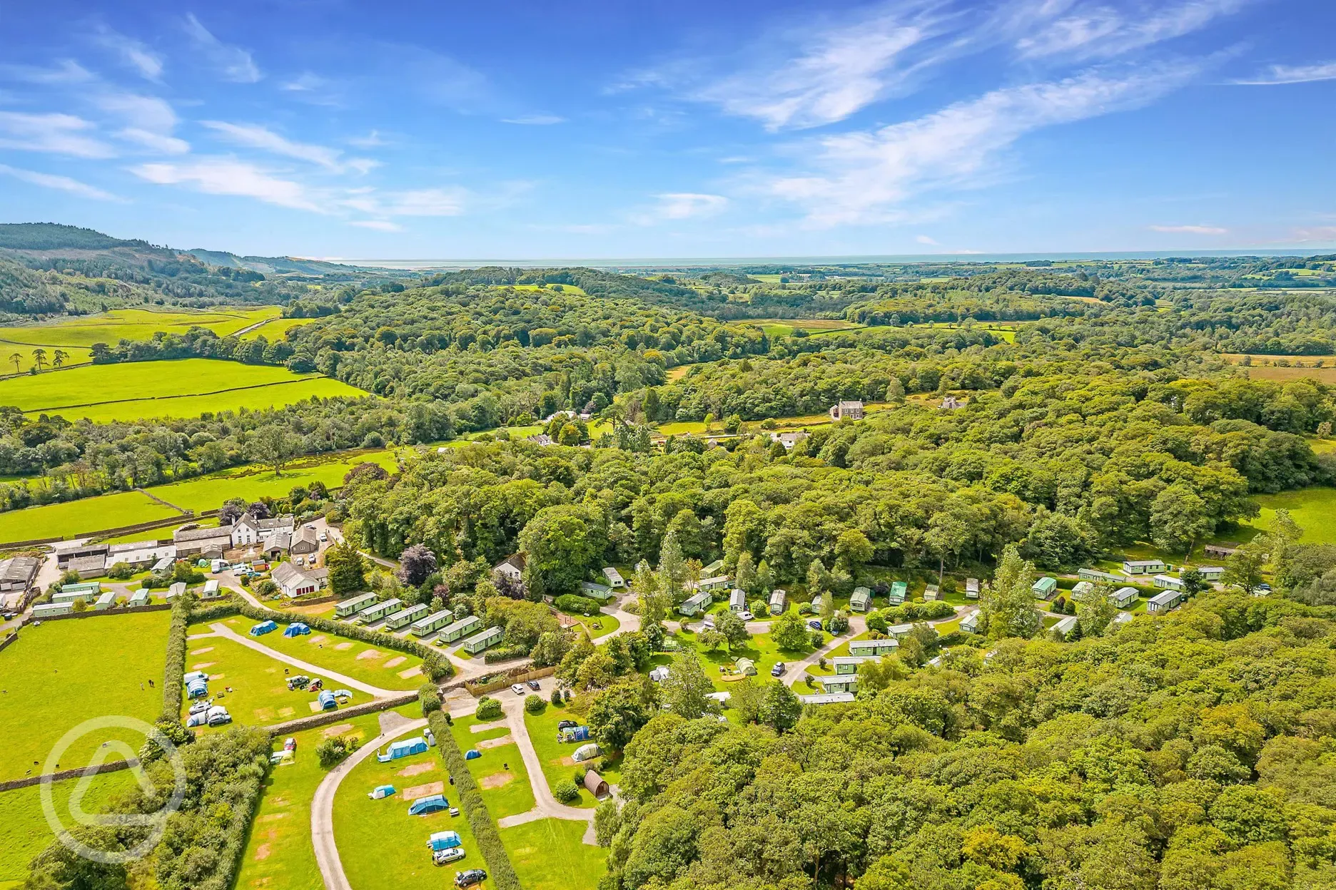 Aerial of Church Stile Farm and Holiday Park and the surrounding woodlands