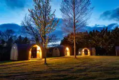 Camping pods at night