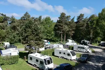 Electric hardstanding and grass pitches at Somers Wood