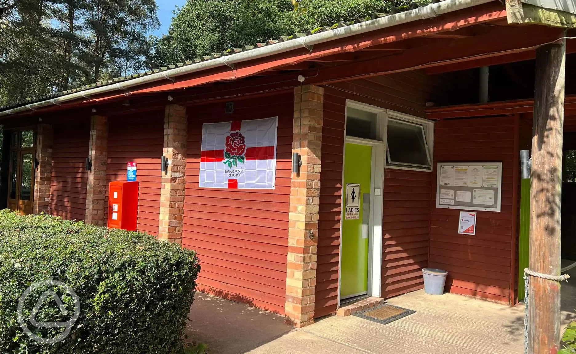 Heated facilities block with a noticeboard 