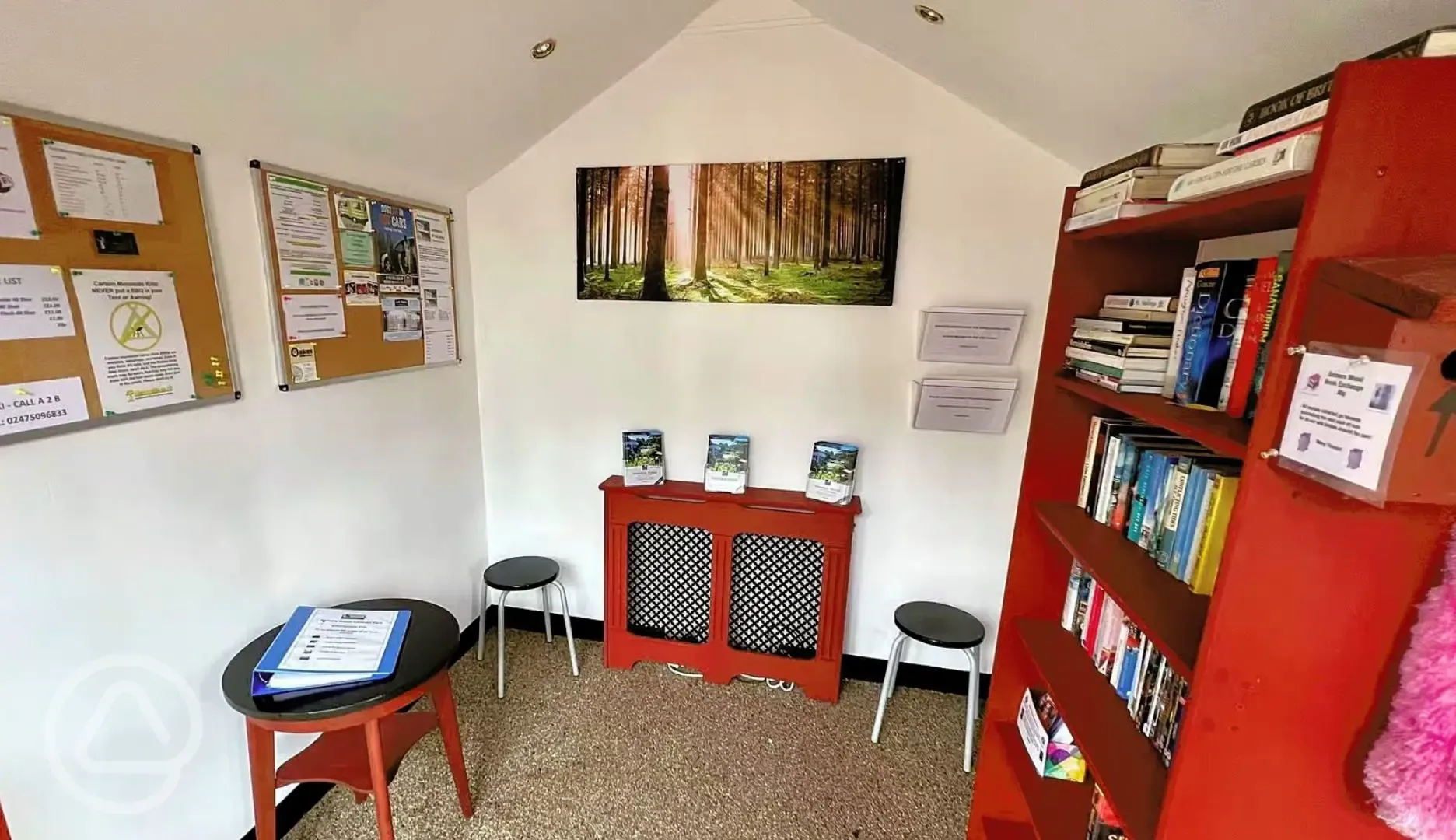 Library cabin filled with books and information surrounding the area