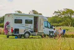 Electric grass pitches for motorhomes, touring caravans and campervans Electric grass pitches for motorhomes, touring caravans and campervans