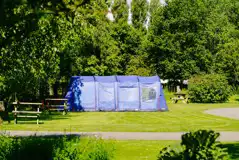 Electric grass pitches with picnic benches
