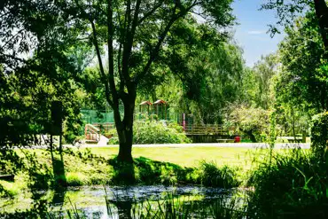 Touring area by the play park at Lickhill Manor Caravan Park
