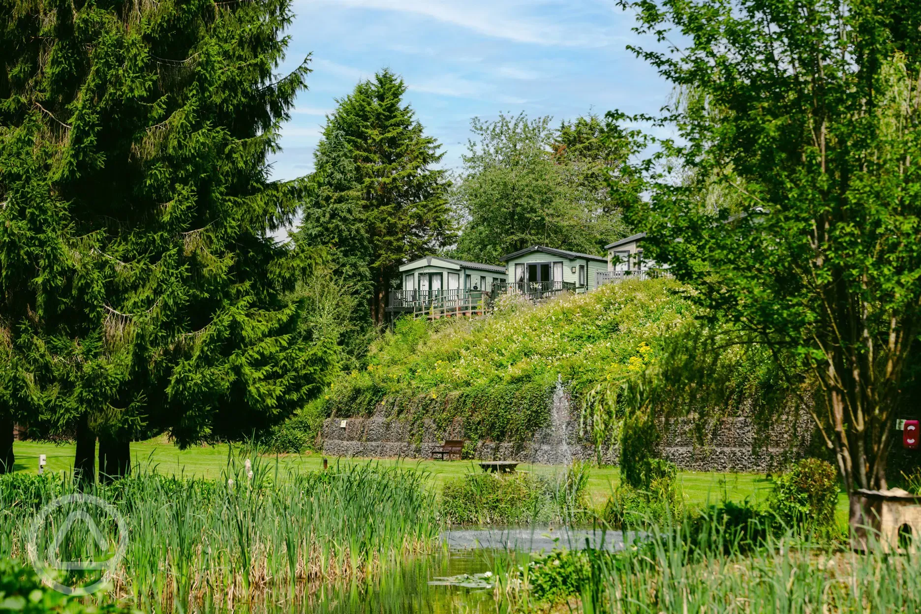 View of the landscaped grounds and pond