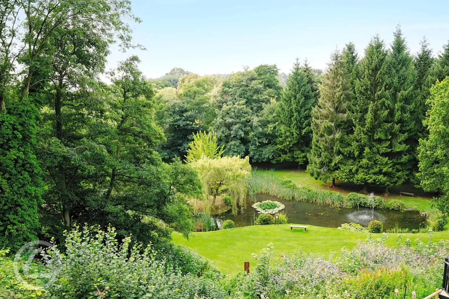 View of the landscaped grounds and pond