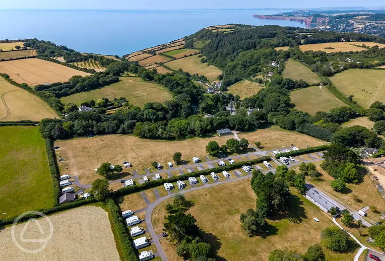 Aerial of Salcombe Regis Camping and Caravan Park with views to the coast