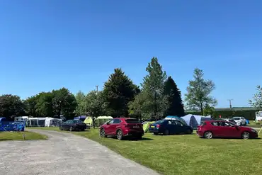 Grass pitches for tents and tourers (with parking)