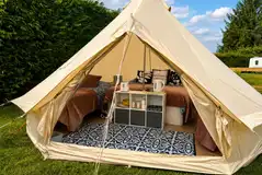 Bell tent exterior and interior at at Zeacombe House Caravan Park
