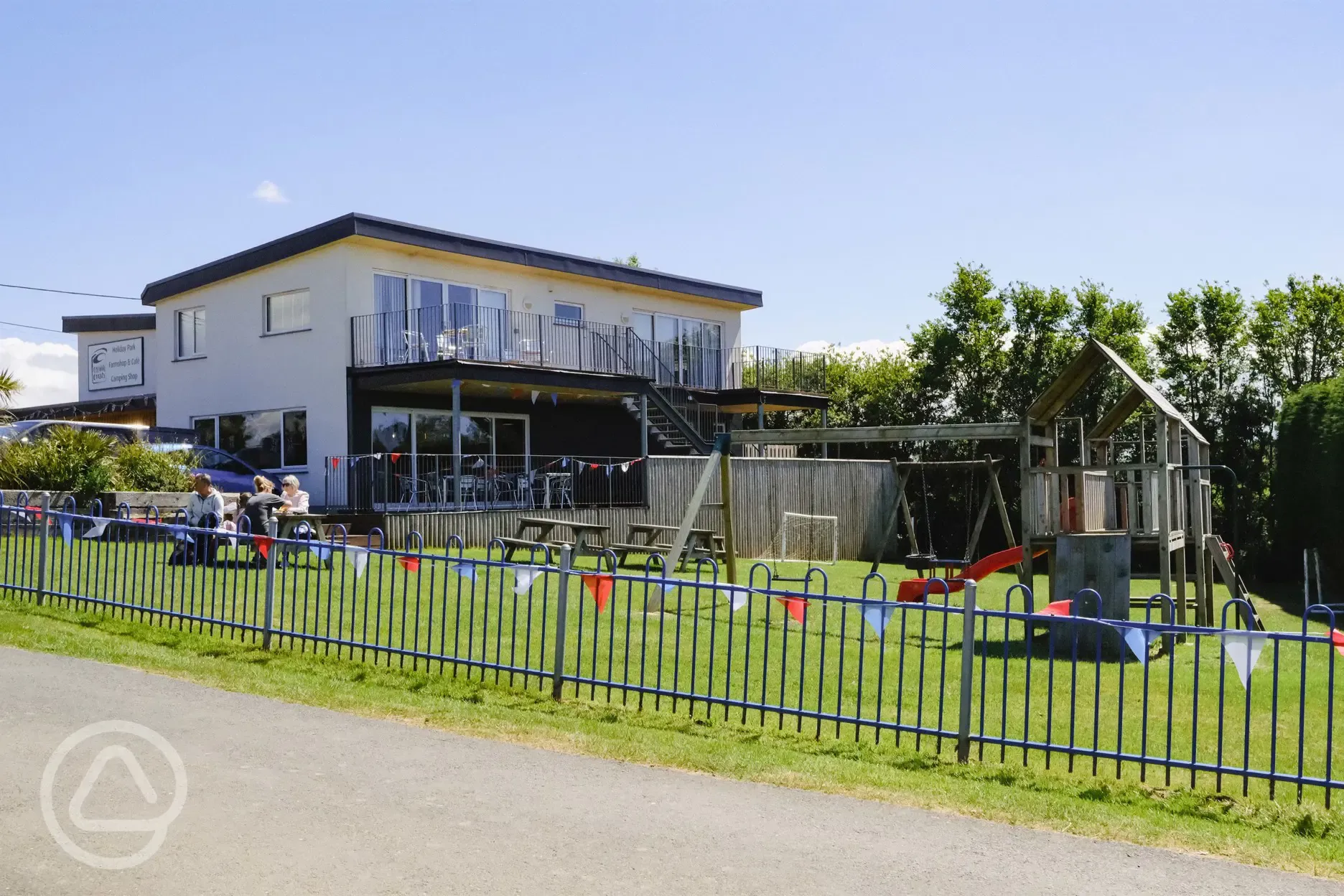 Café, shop and play park overview at Cornish Coasts Caravan and Camping Park