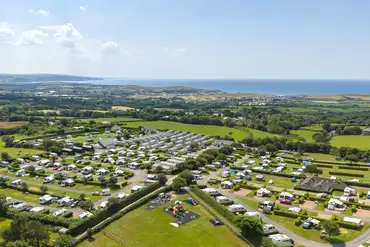 Aerial of Wooda Farm Holiday Park with views to Bude Bay