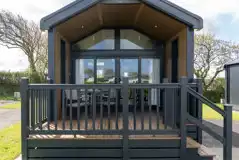 Ensuite glamping cabin with decking area and seating