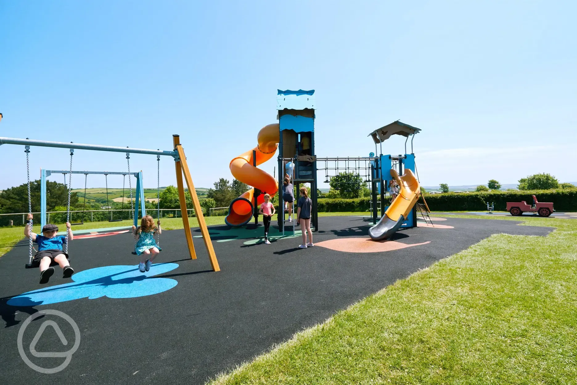 Swings and slides at the children's play area