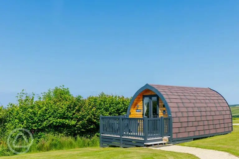 Glamping pod with a small decking area