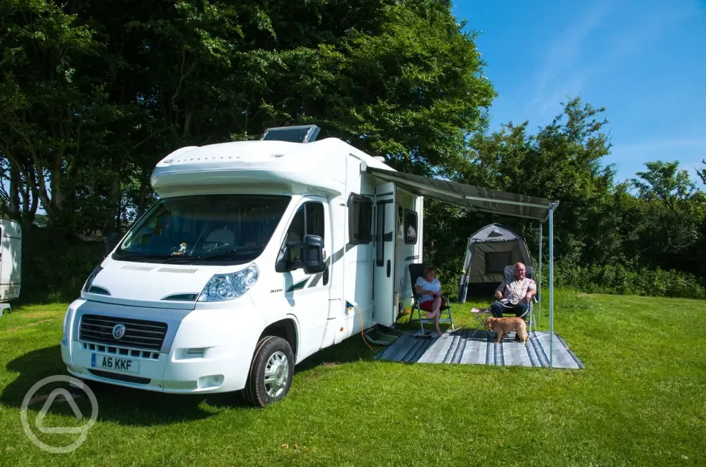 Grass pitches with space for an awning
