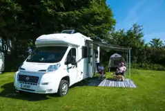 Grass pitches with space for an awning Grass pitches with space for an awning