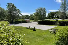 Plus fully serviced hardstanding pitches with picnic bench