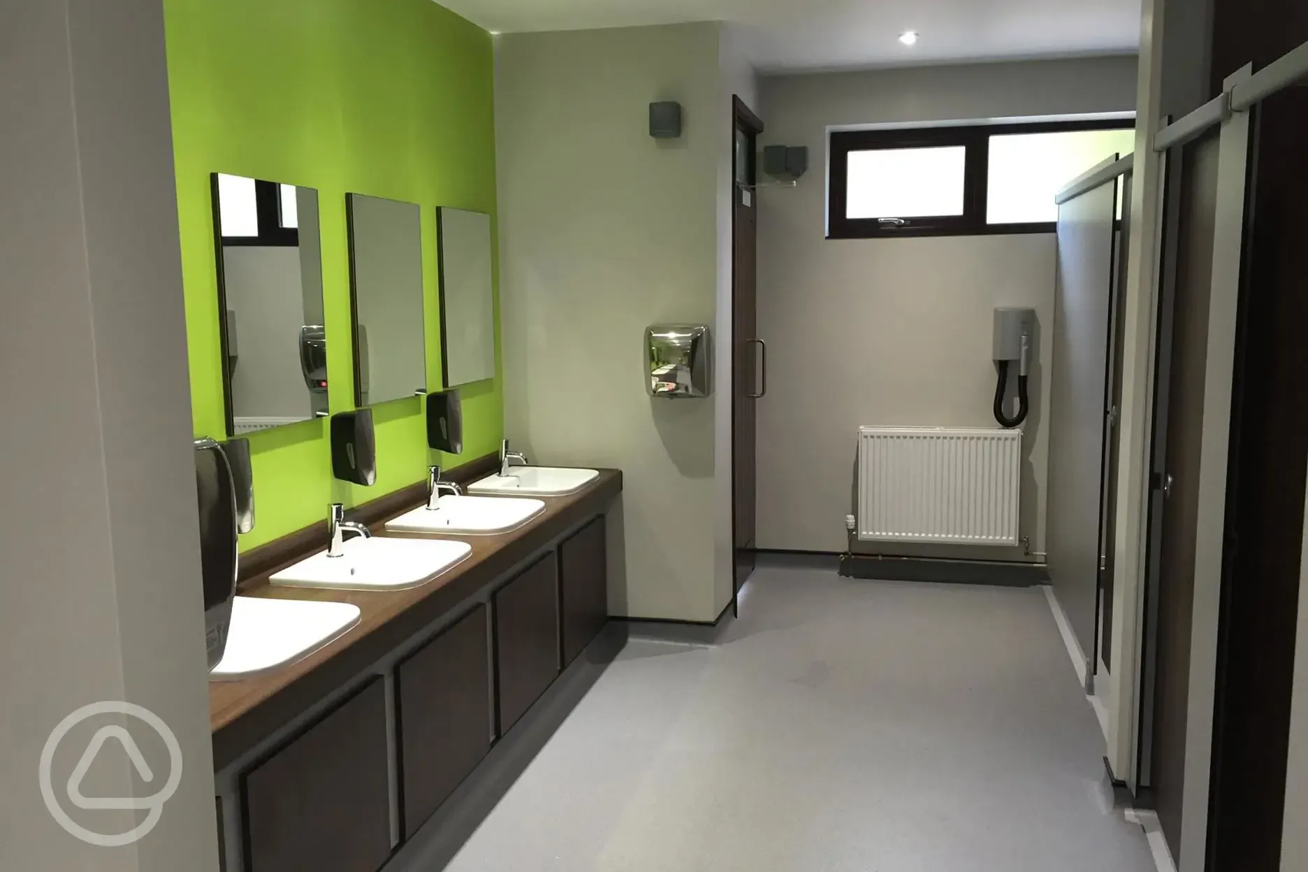 Modern toilet and shower blocks with hair dryers